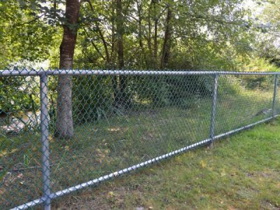 Closeup Of A New Chain Link Fence In A Park